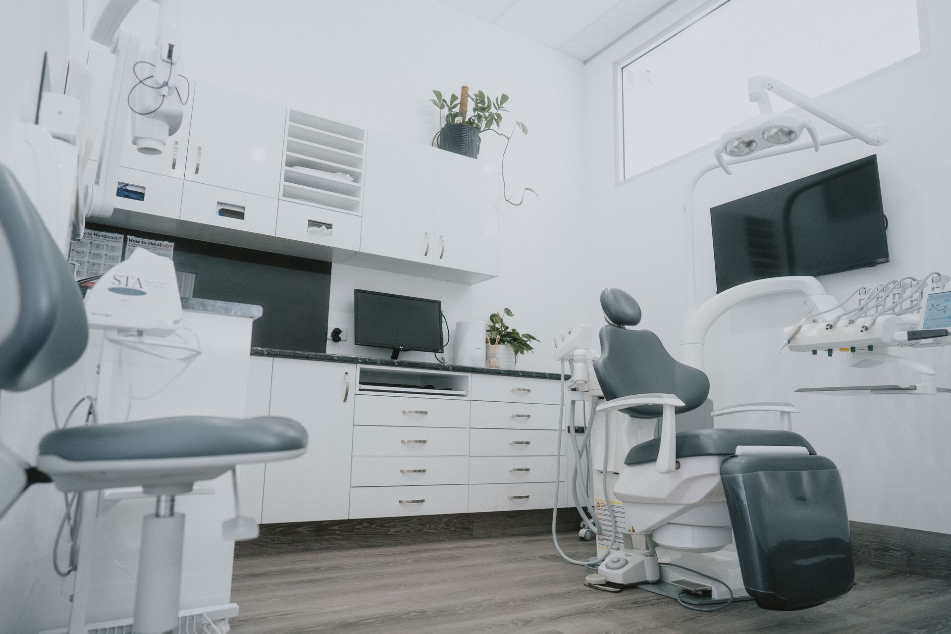 Dental Office Interior With Chair, Cabinets, and Tools — New Leaf Dentists In Erina, NSW