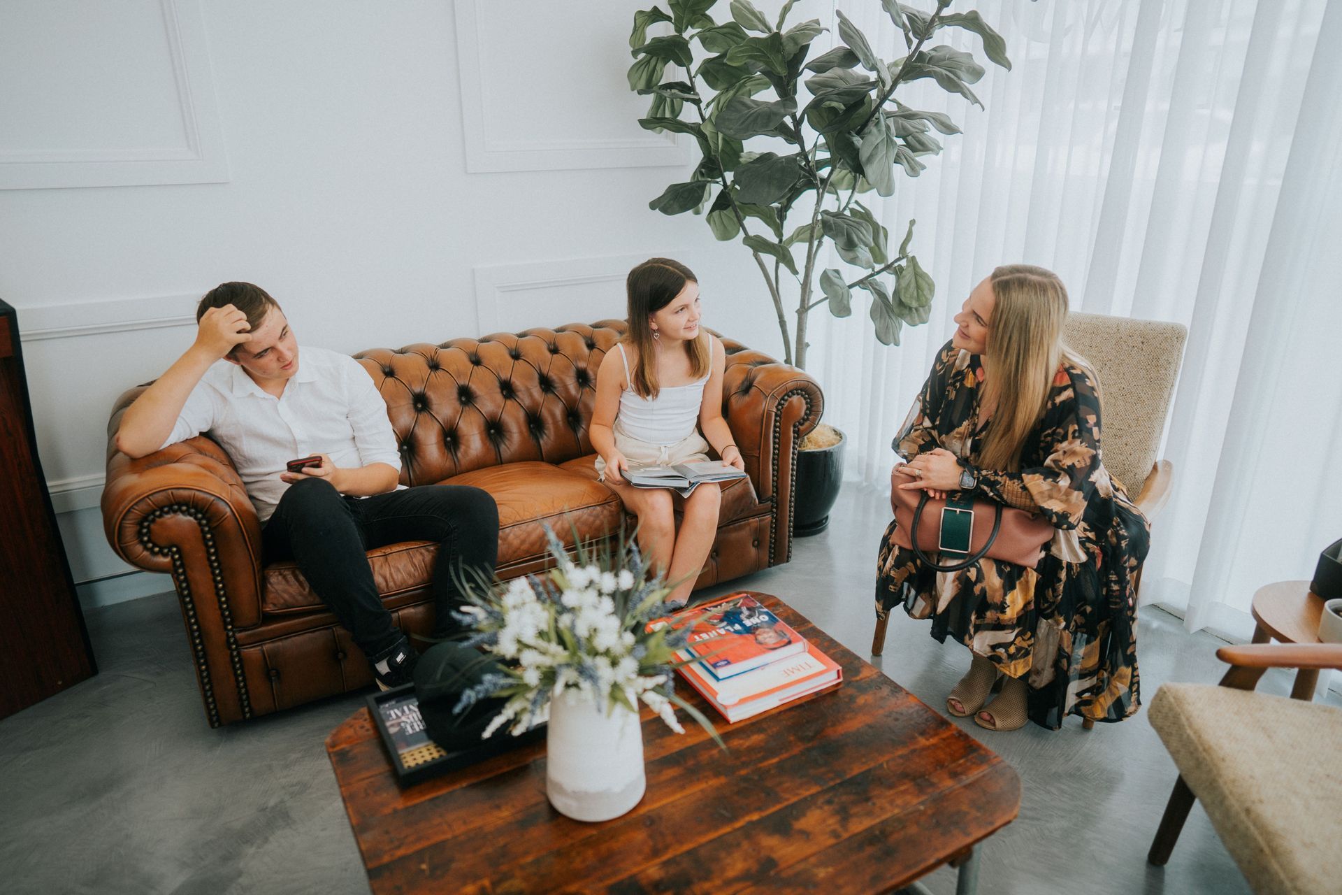 Three People in a Bright Room — New Leaf Dentists In Erina, NSW