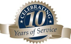 A seal that says celebrating 10 years of service