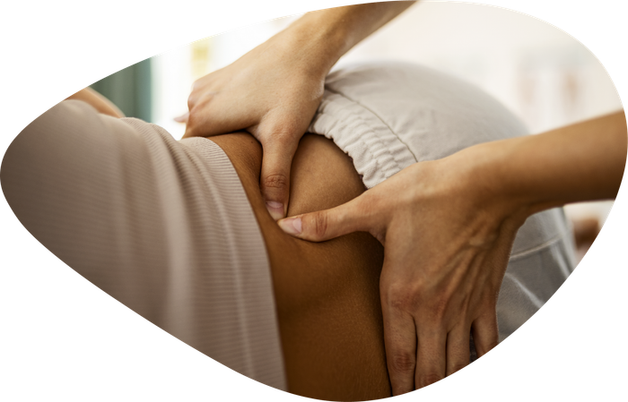 A person is getting a massage on their back