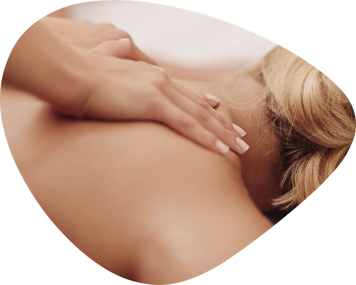 A woman is getting a massage on her back