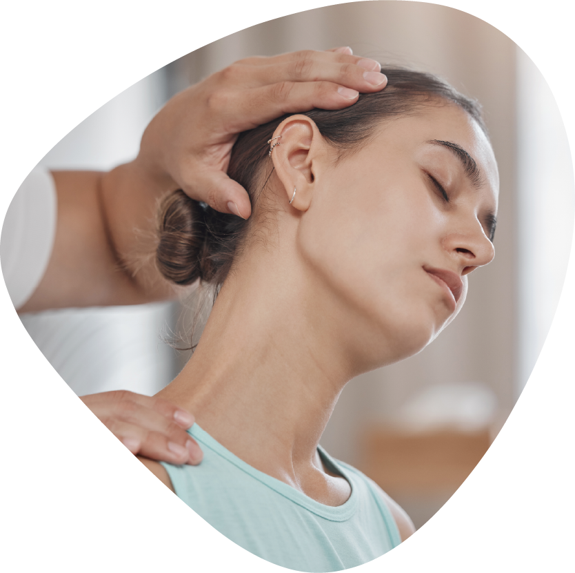 A person is getting a massage with their hands on their back.