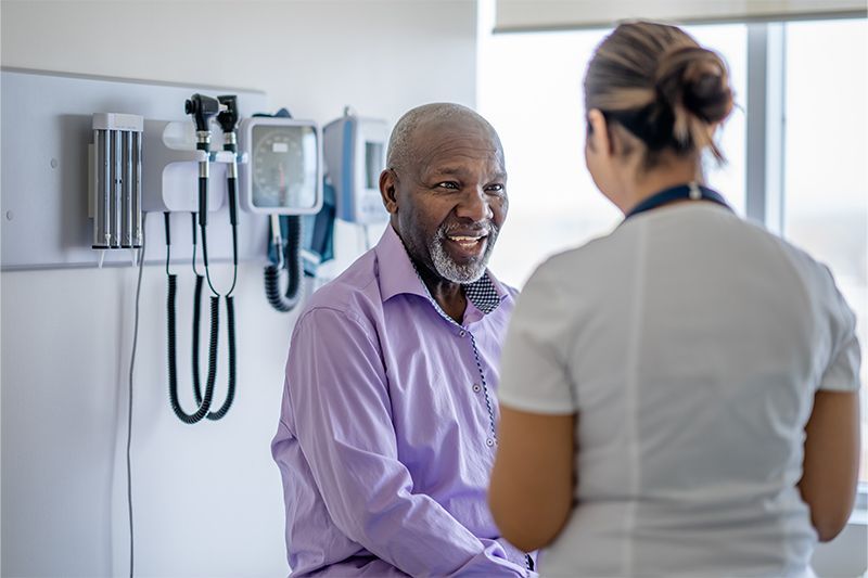 A man waits for his nurse to administer a blood test that will answer the question he’s been strugg