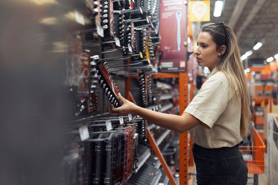 Picture of a customer at a truck accessory store looking for tools and accessories. Picture of a customer at a truck accessory store looking for tools and accessories.