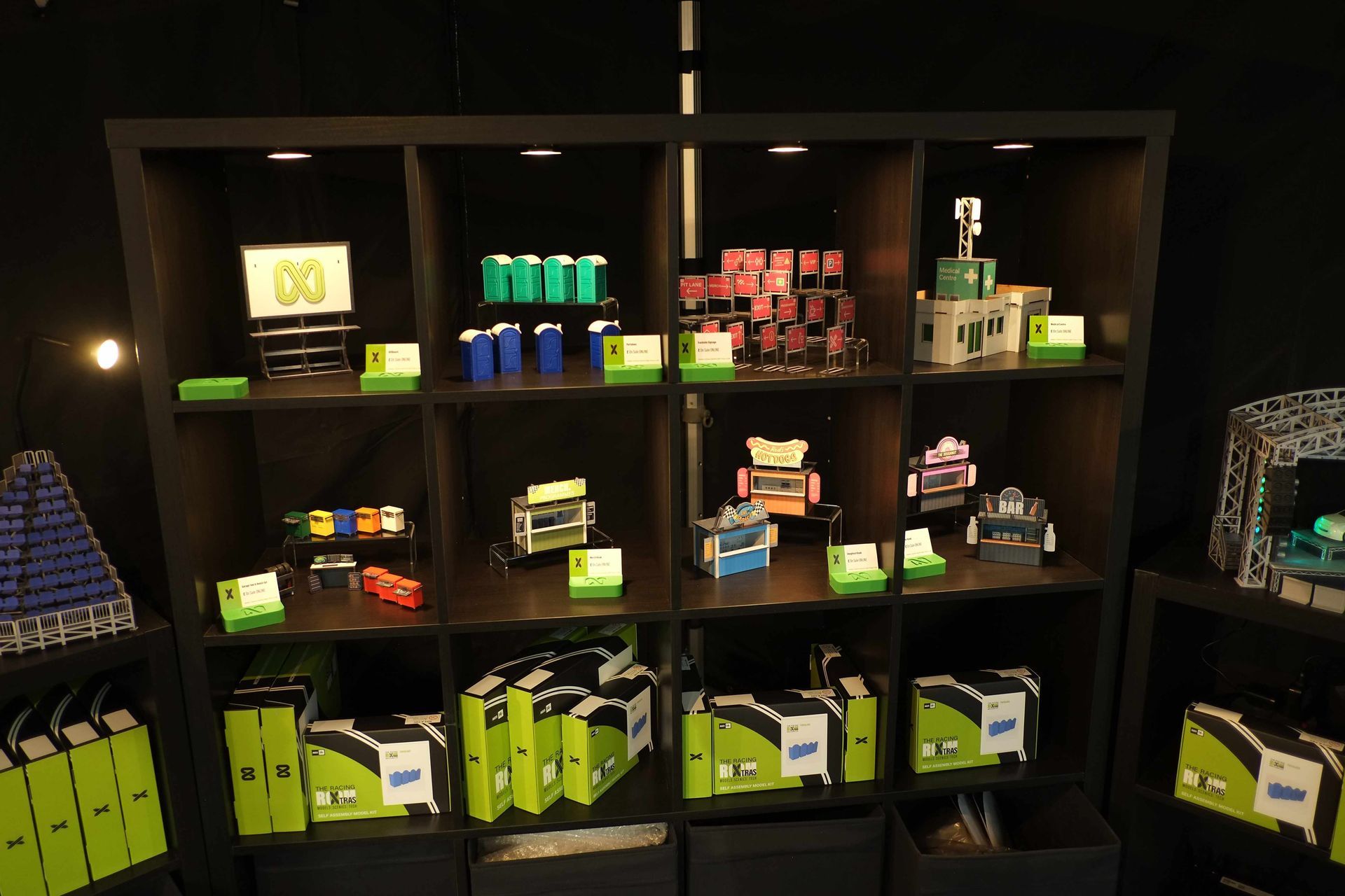 Display of model scenic kits for Scalextric slot car tracks.