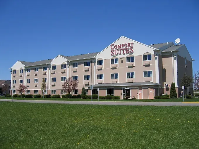 Red corrugated metal roof with vents. Red corrugated metal roof with vents.