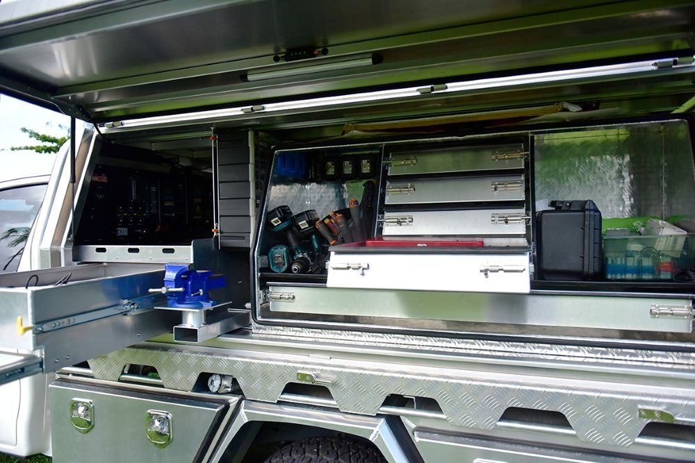 The Inside Of A Truck With The Doors Open And Lots Of Drawers — Troy Cummings Locksmith In Bungalow, QLD