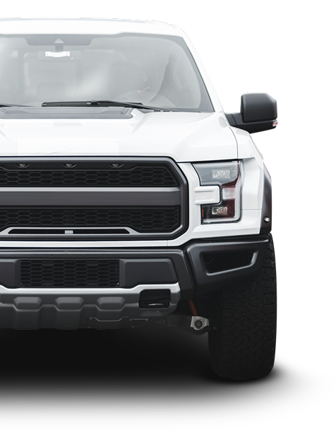 White Ford Raptor truck, front view, black grill and bumper.