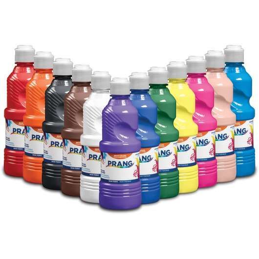 A bunch of bottles of paint are lined up in a row