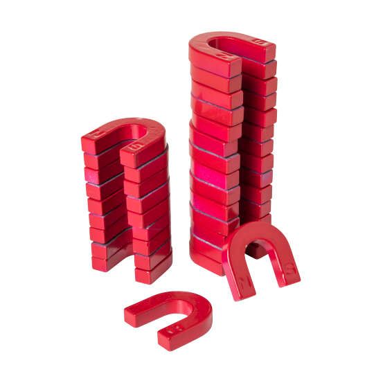 A stack of red horseshoe magnets on a white background