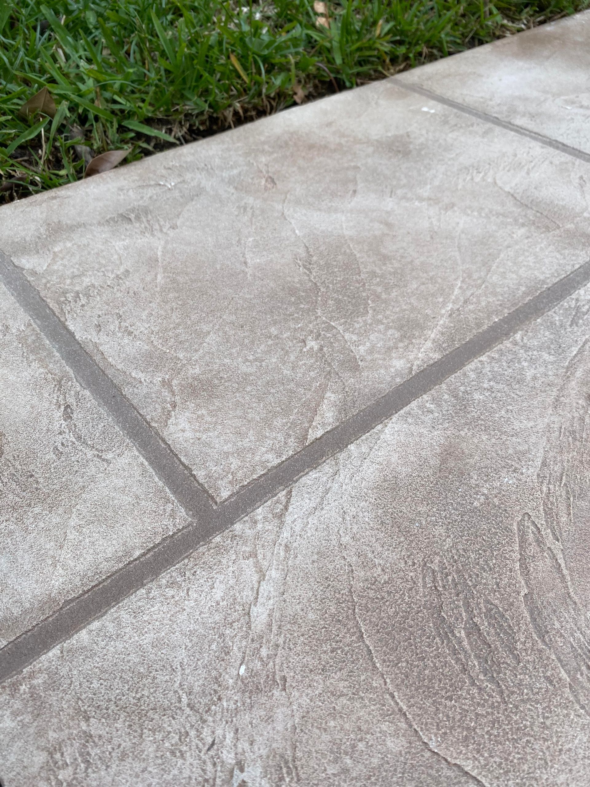 a long hallway in a building with glass walls