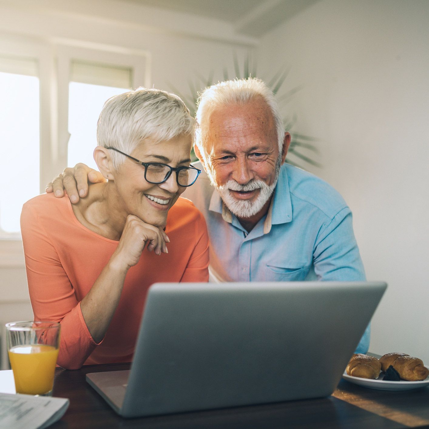Senior Couple Checking the Laptop — Hollywood, FL — Tradition Homecare