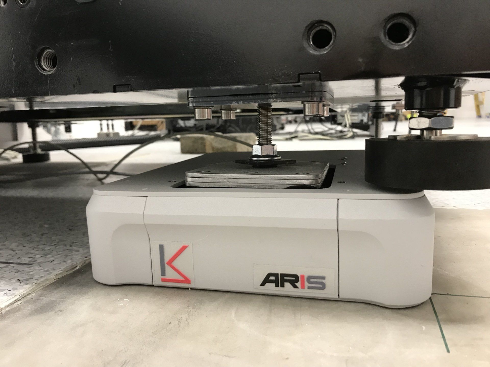 ARIS vibration isolation platform by K&S with mounted equipment in a laboratory setting