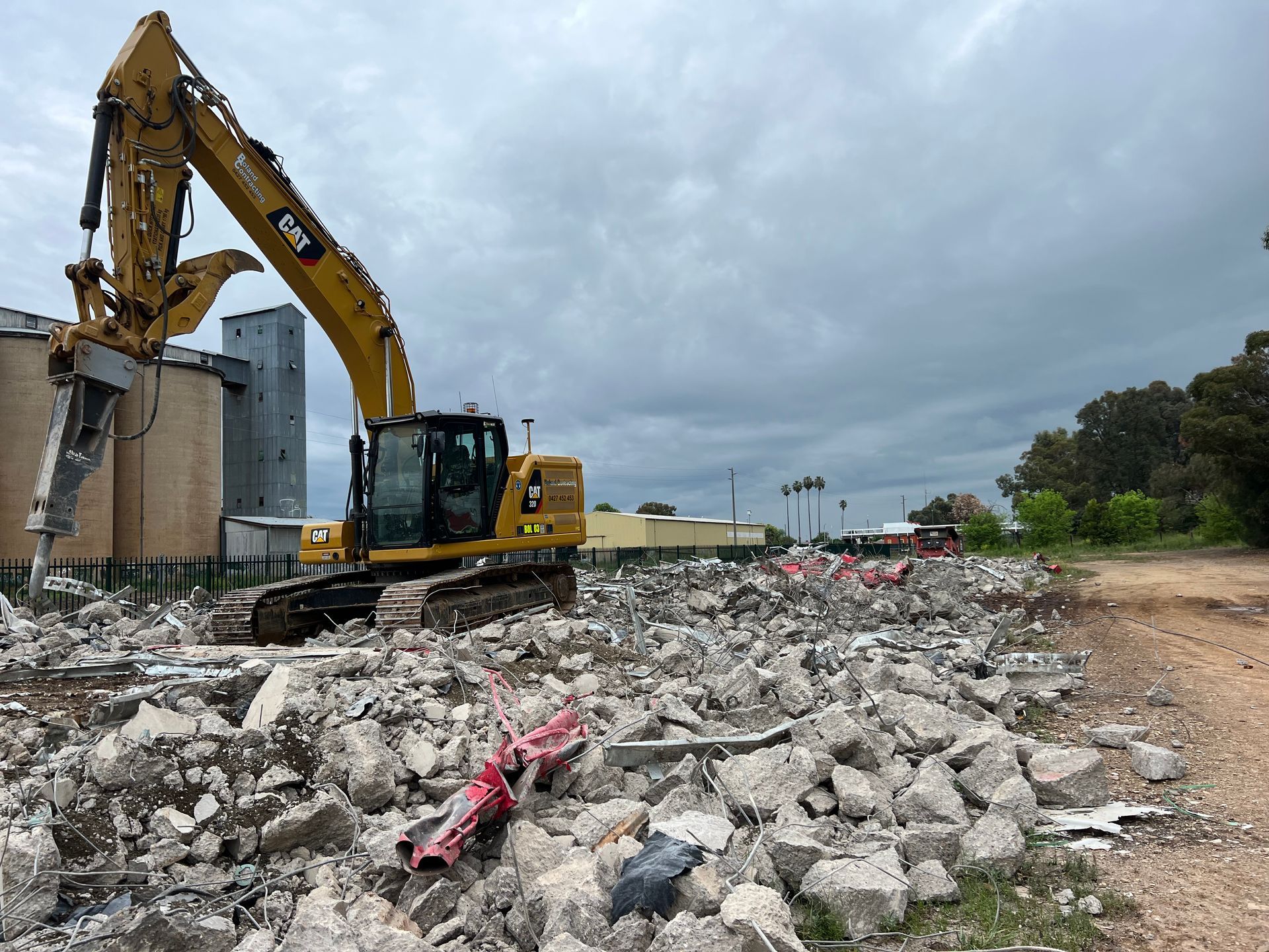 Room Undergoing Renovation Walls Partially Demolished Debris on the Floor — Boland Contracting In Mudgee, NSW