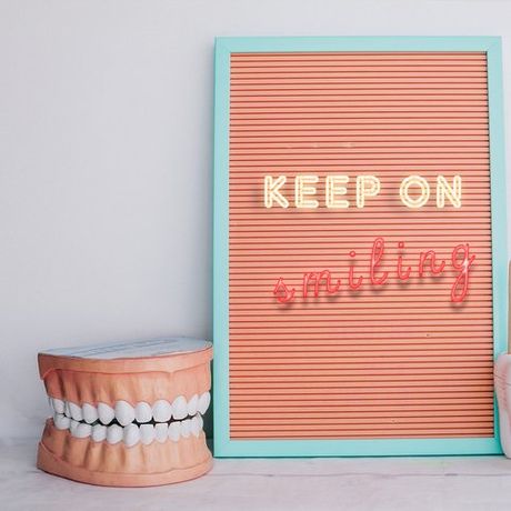 keep smiling sign