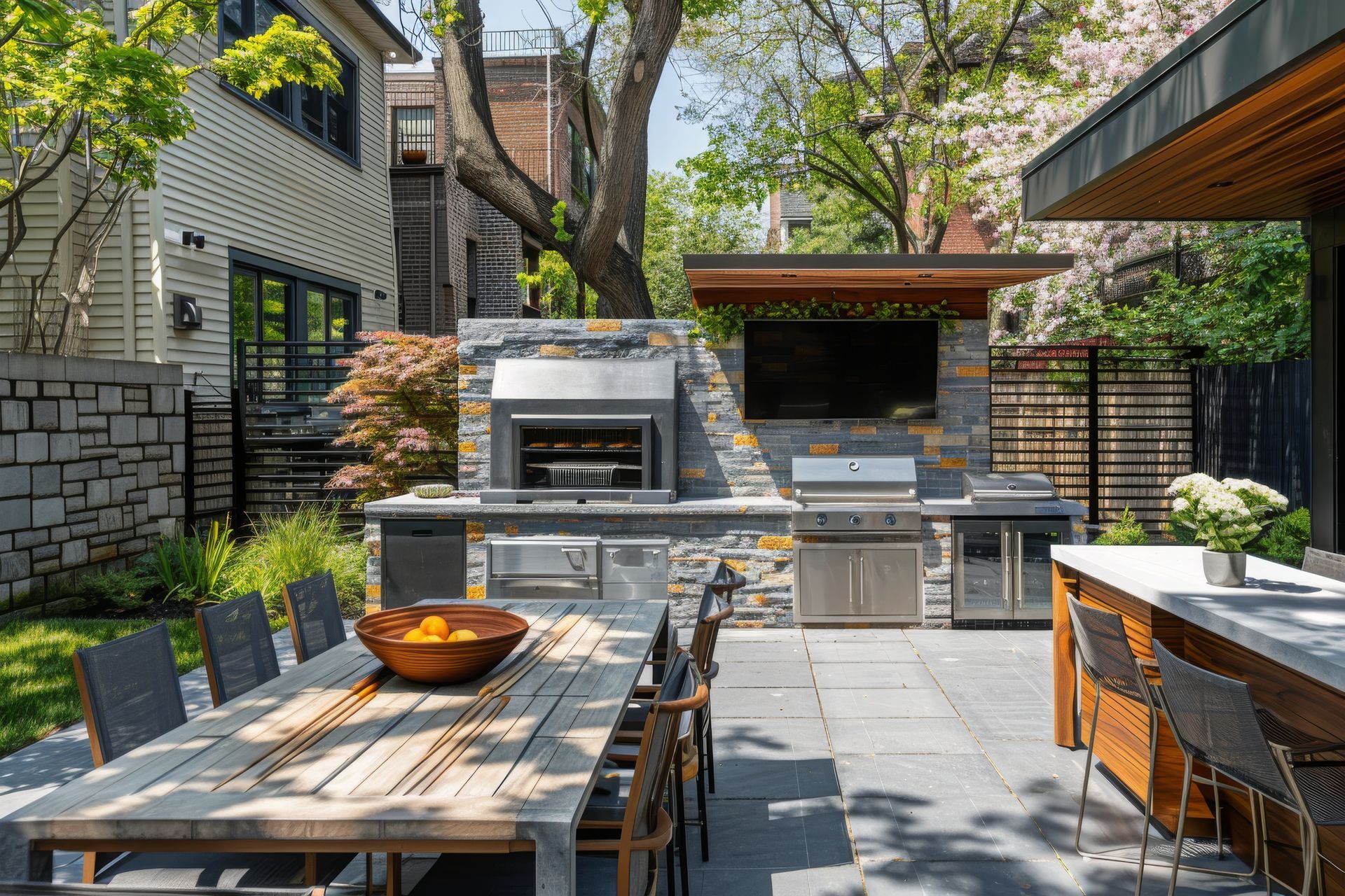 There is a large wooden table and chairs in the backyard.