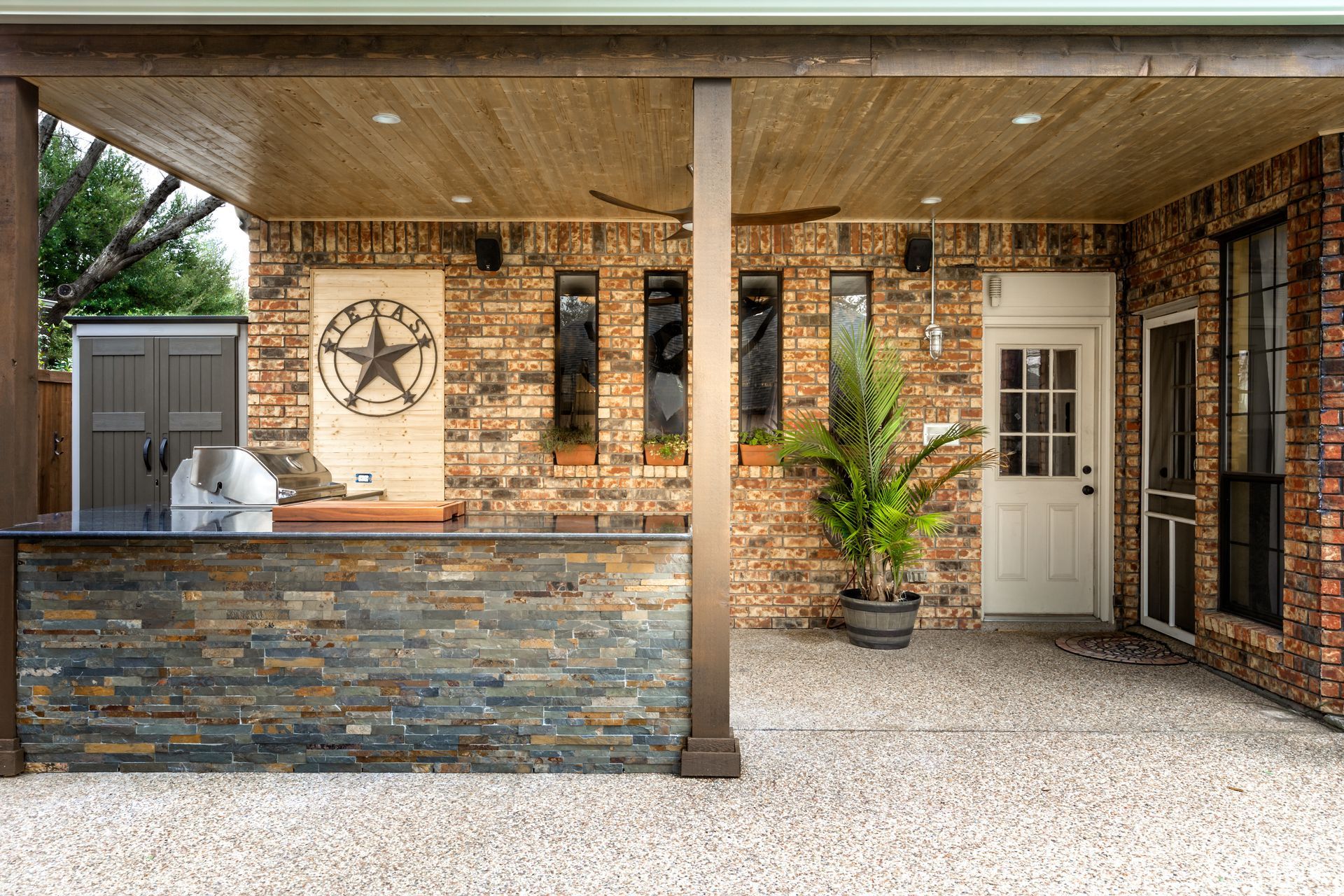 a brick wall with a texas star on it