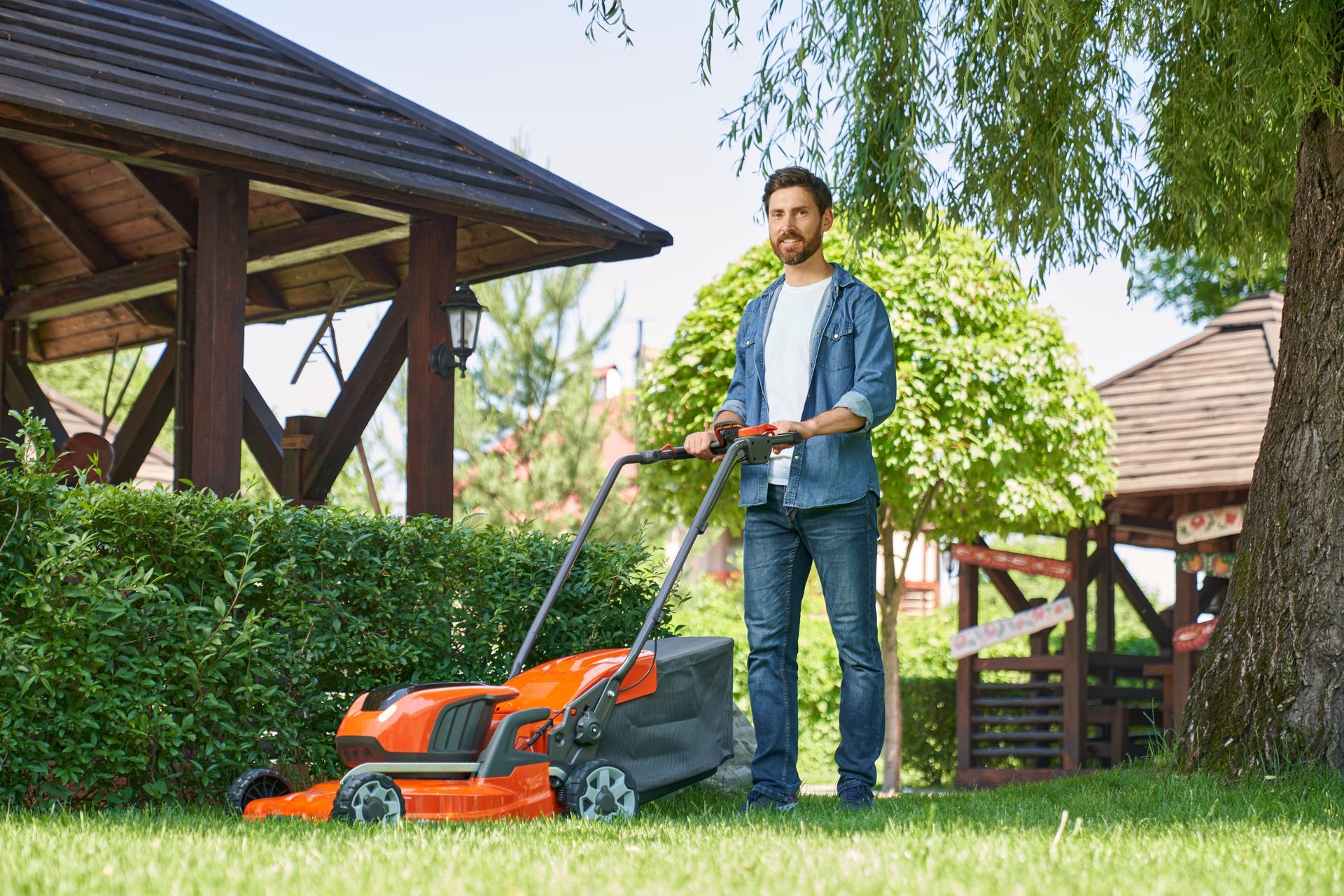 landscaper trimming the lawn