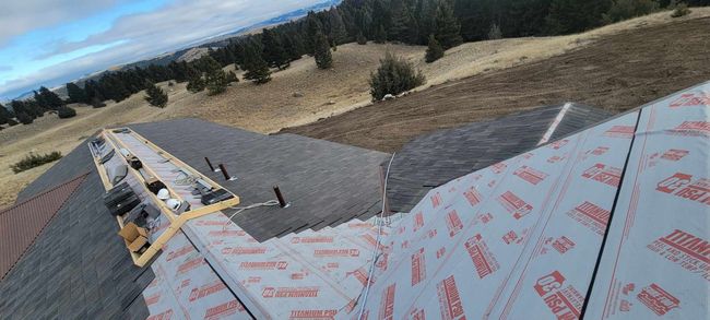 Kalispell Roofing Pros- custom roof - metal roof installation - davinci shake roof