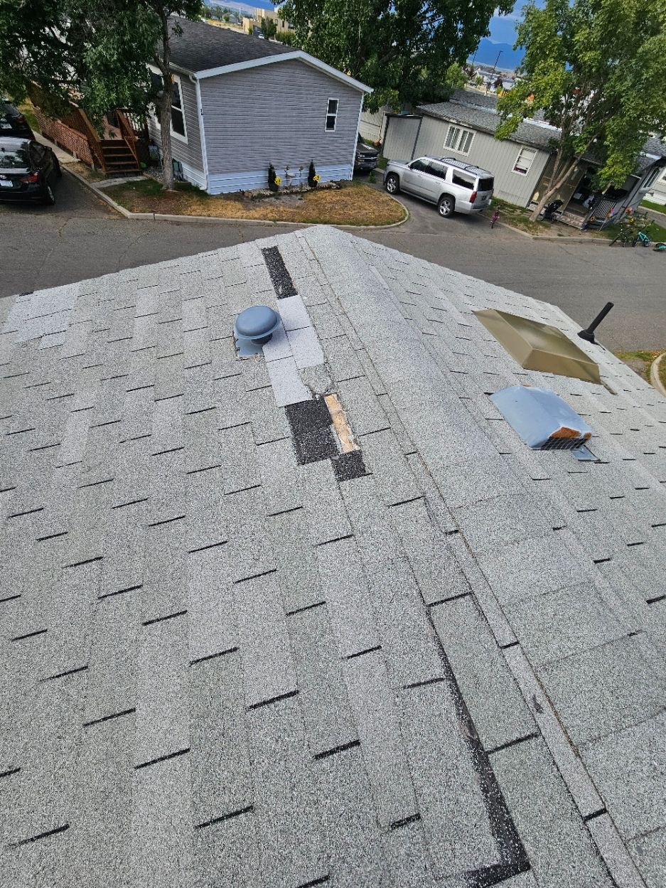 kalispell roofing pros - missing shingles - roof damage kalispell - storm damage roof repair