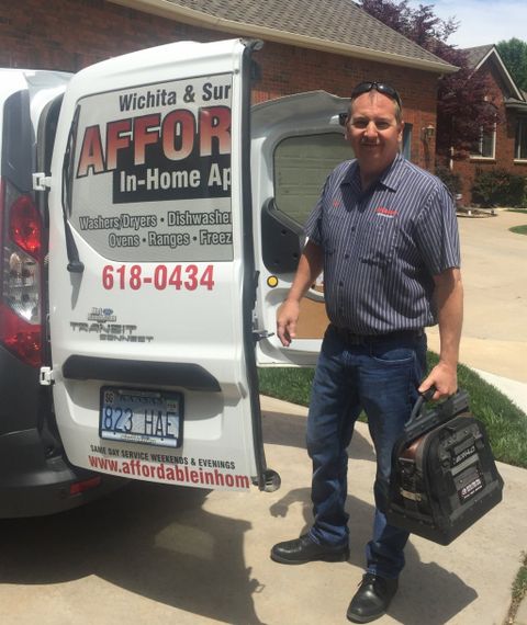 Appliance Repair — Standing Repairman in Wichita, KS