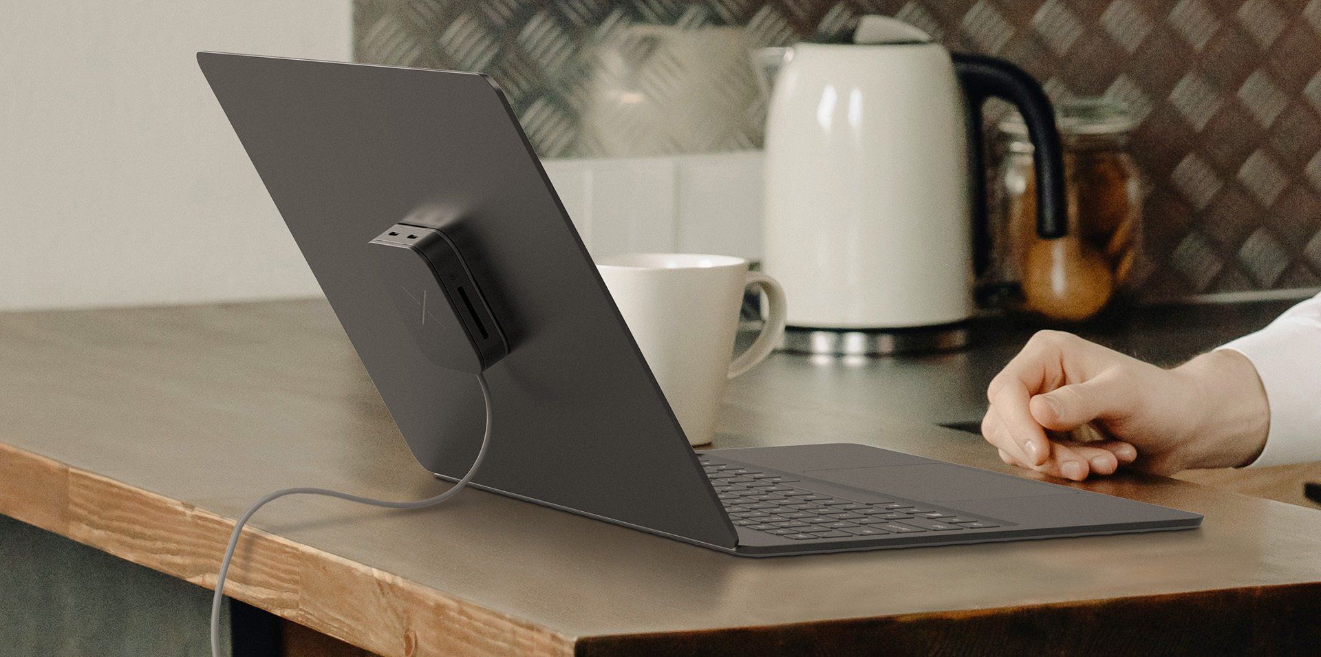 Impossibly Thin Laptop Craob X with Media and Charging Hub Attached