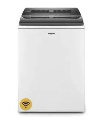 A white washing machine with a yellow sticker on it.