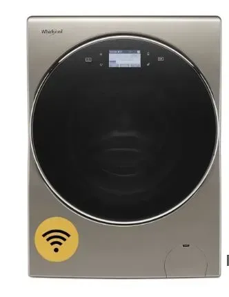 A washer and dryer with a yellow sticker on it.