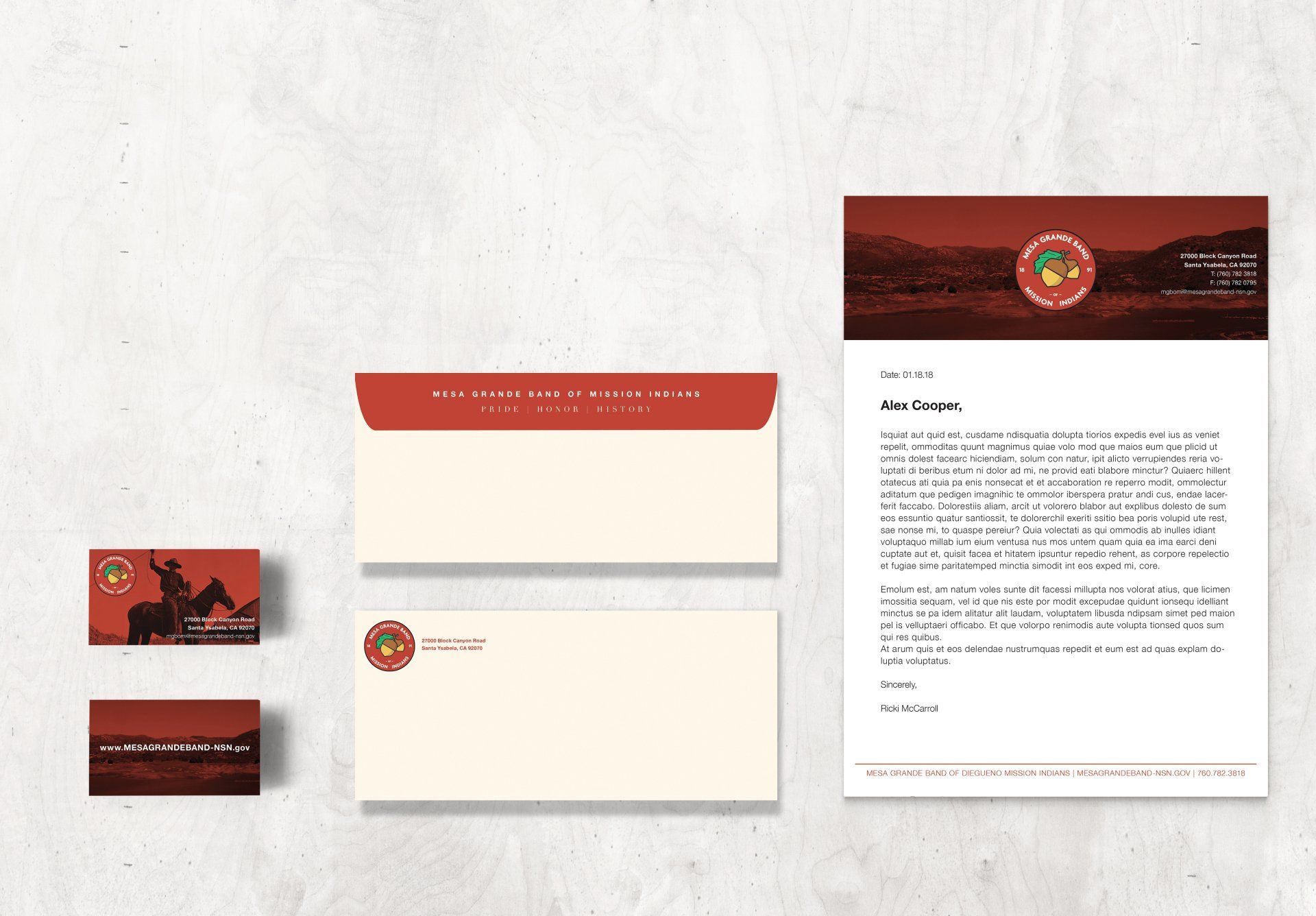 a set of business cards , envelopes , and a letterhead