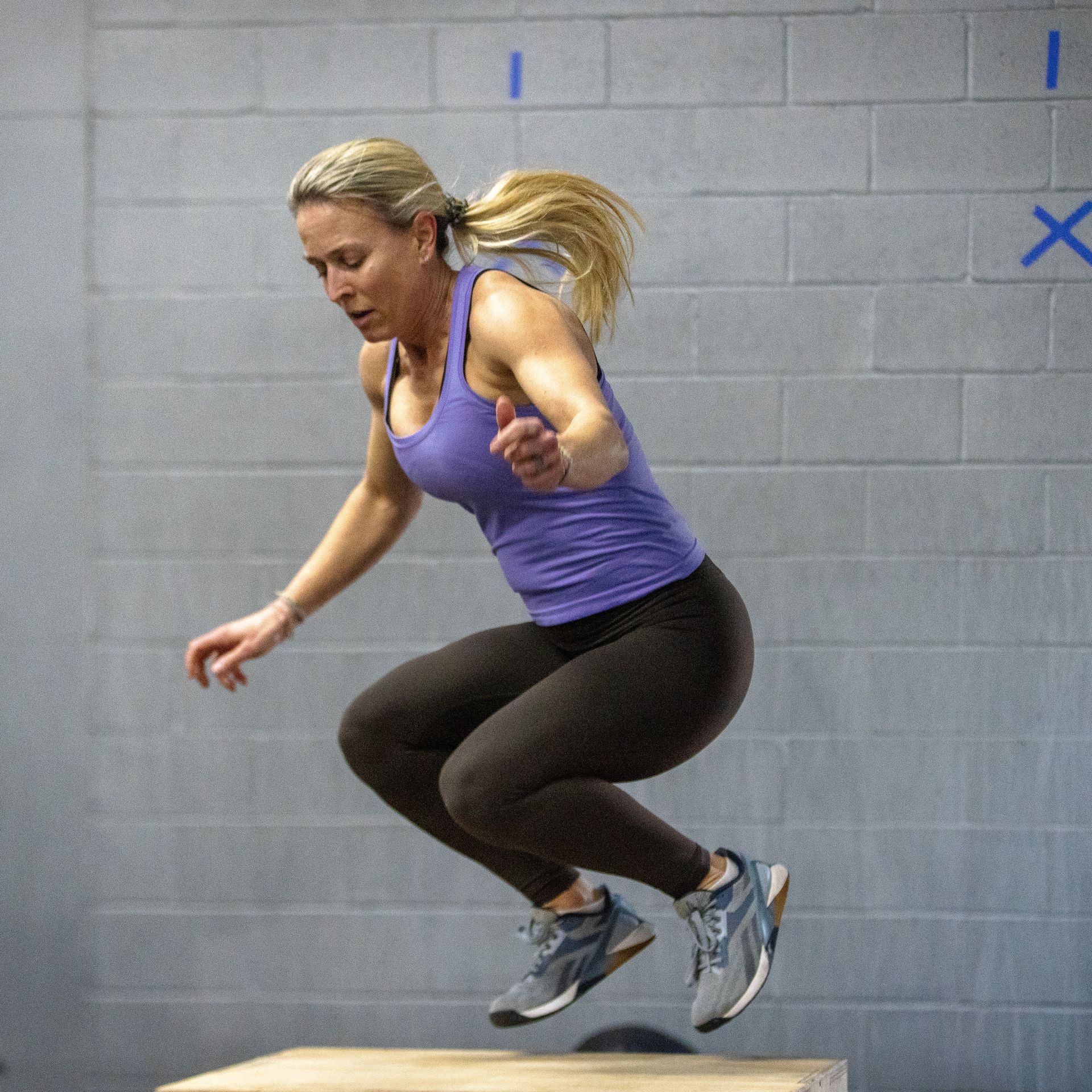 Outsiders CrossFit athlete performing a box jump during a CrossFit workout in Sparks Maryland
