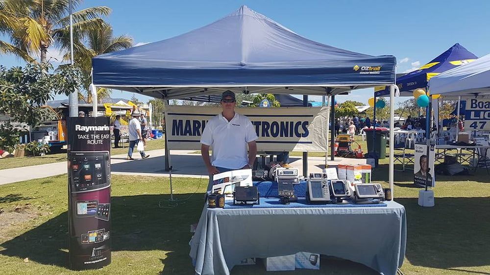 A Man is Standing in Front of a Table Under a Tent — Seabourne Electronics PTY Ltd in Railway Estate, QLD