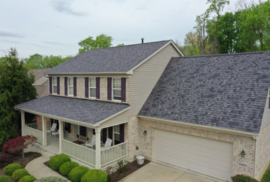 Roofers Cincinnati - house and garage roof replacement with grey shingles