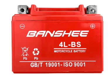 Red Banshee motorcycle battery with white lettering, positive and negative symbols, and recycling symbols.