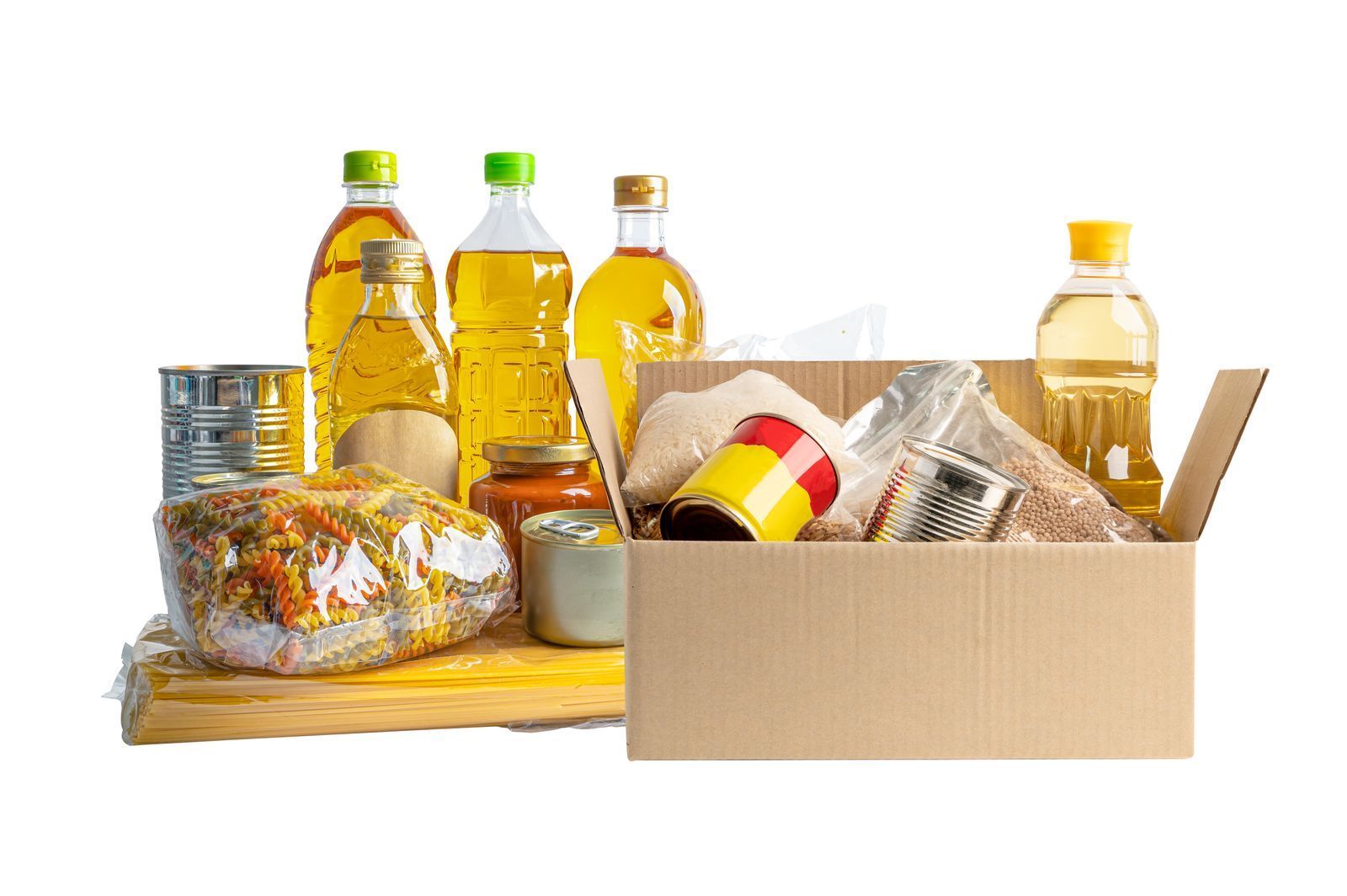 Various food, pasta, cooking oil and canned food in cardboard box