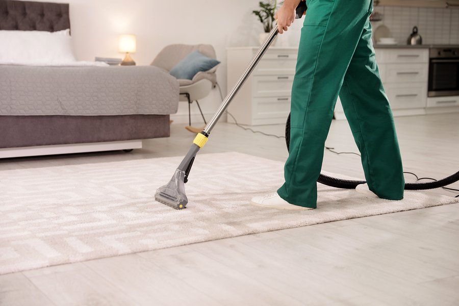 someone cleaning the carpet