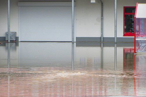 Commercial building flooded with water.