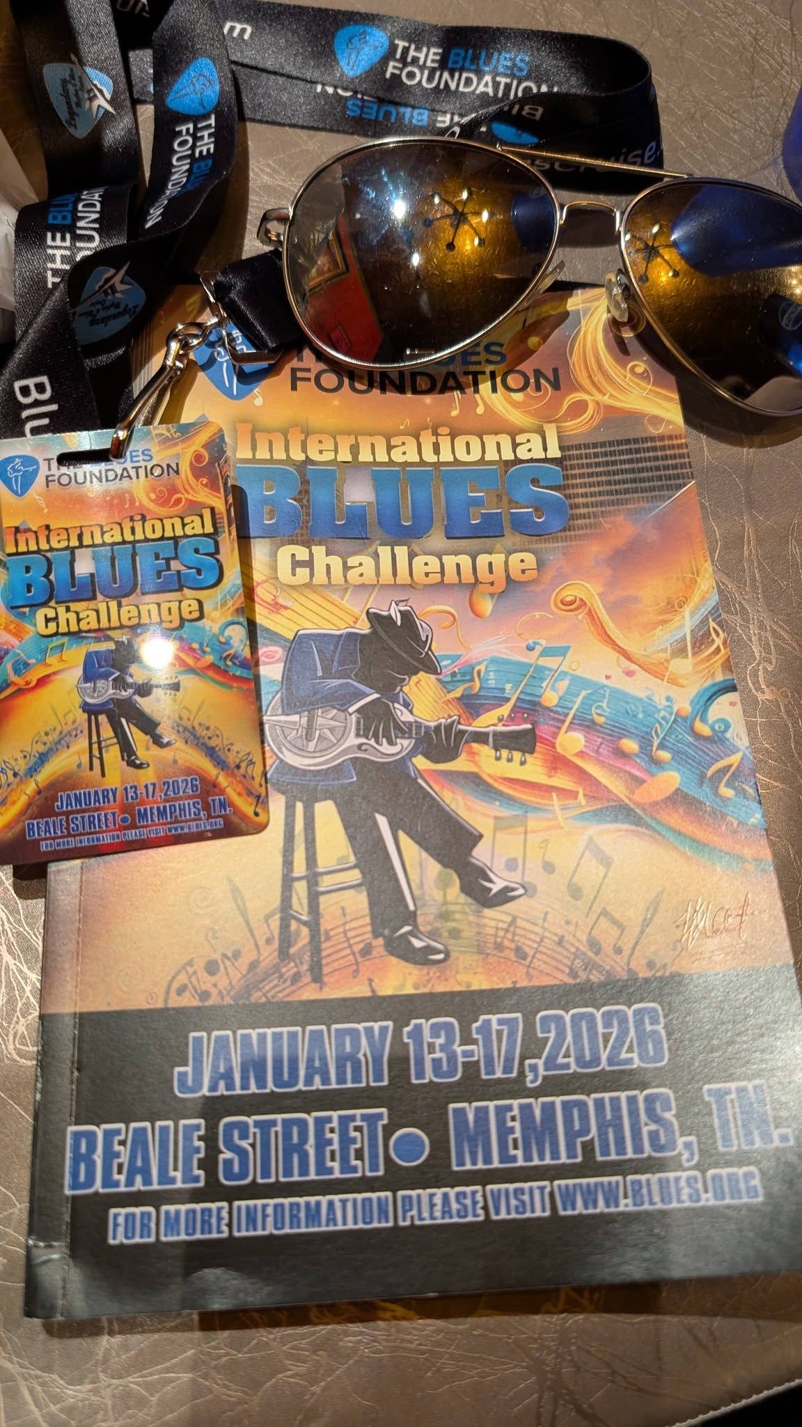 A photograph of the IBC's poster and program