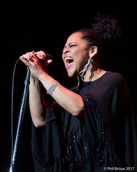 Dawn Tyler Watson clutching her microphone and walloping to the  world  with her wonderful set of pipes!