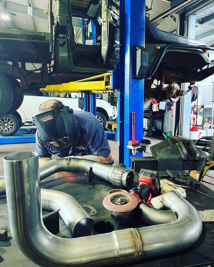 A Welder Working on the Repair Shop — Atherton Mechanical Services in Atherton, QLD