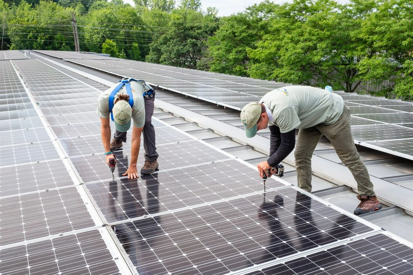 Men Installing Solar Panels - Bristol, VT - Mountain Energy Design