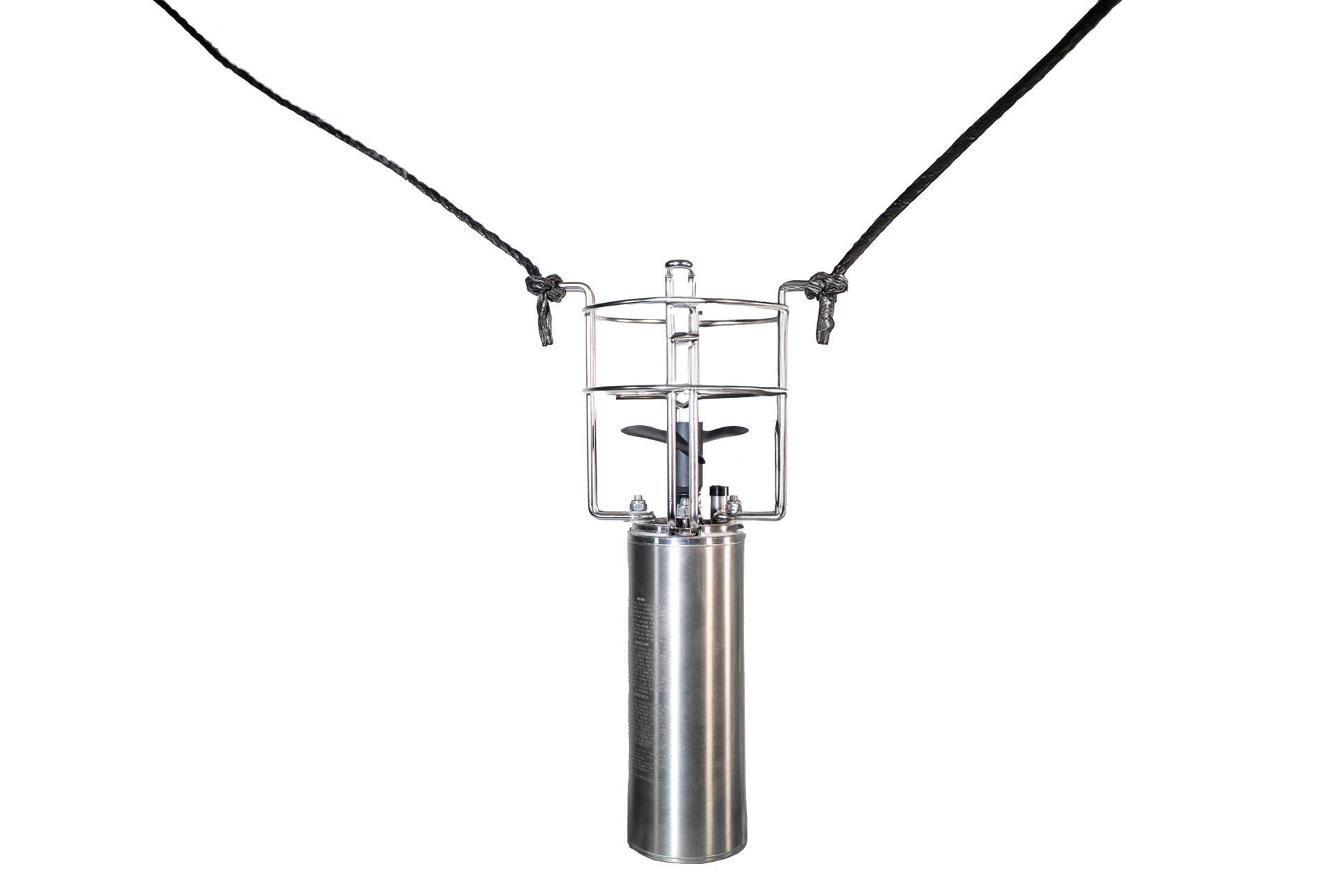 A waterfront bubbling device on a wooden dock with a lake in the background.