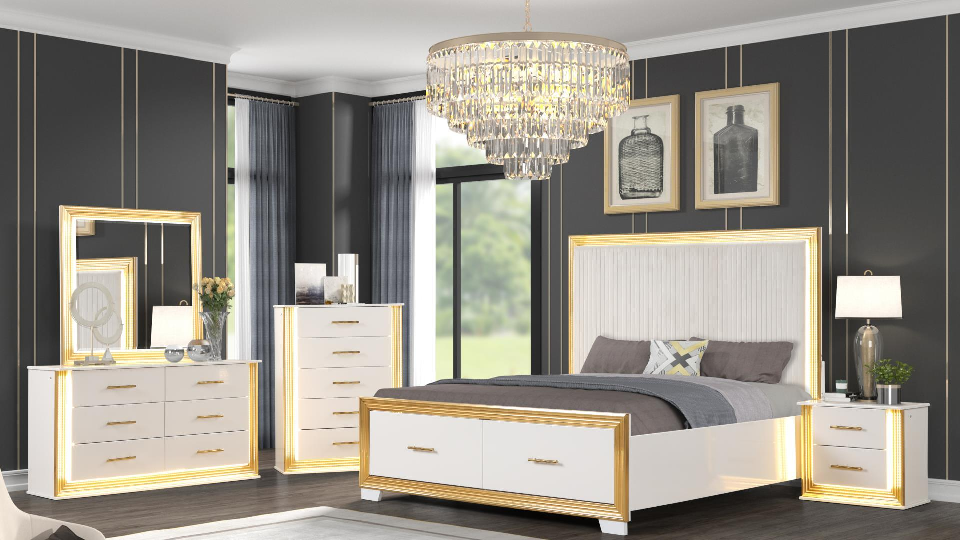 Bedroom furniture set with white and gold accents. King bed, dresser, mirror, chest, and nightstands.