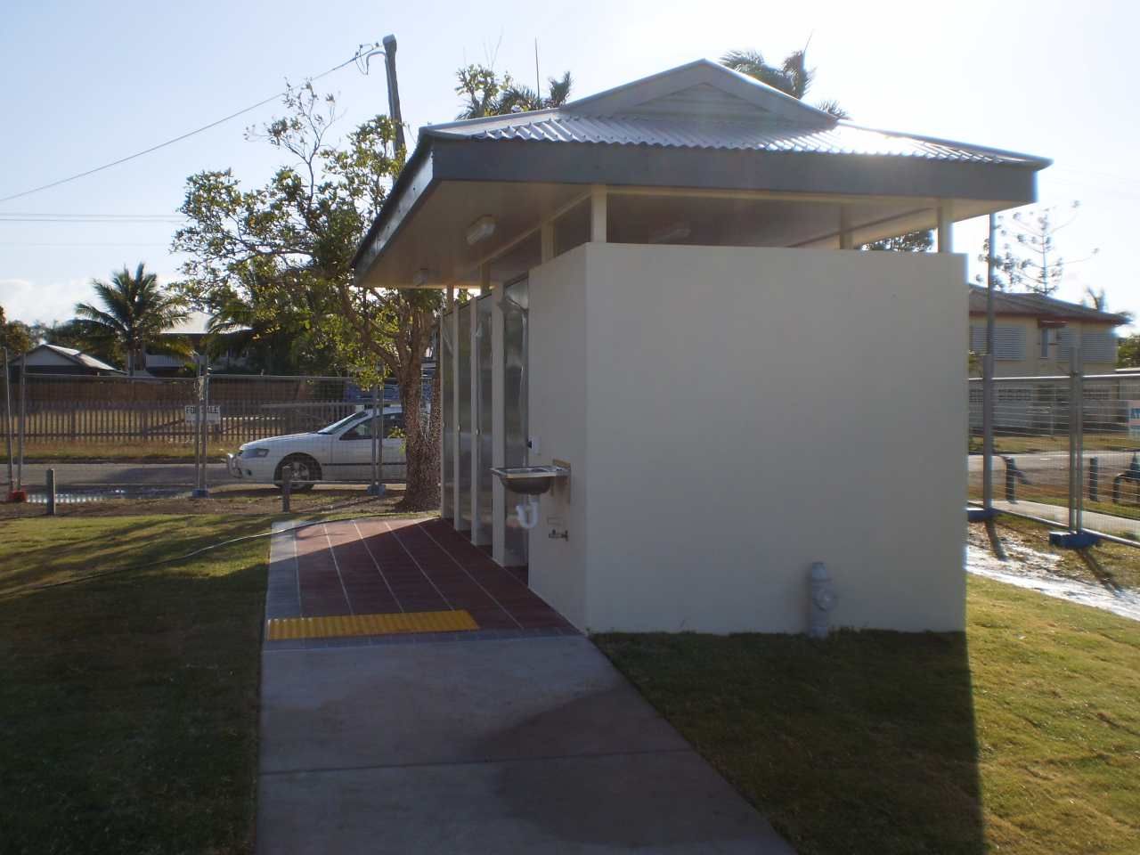 A Small White Building With a Roof and a Sink — Shedquarters In Kirwan, QLD