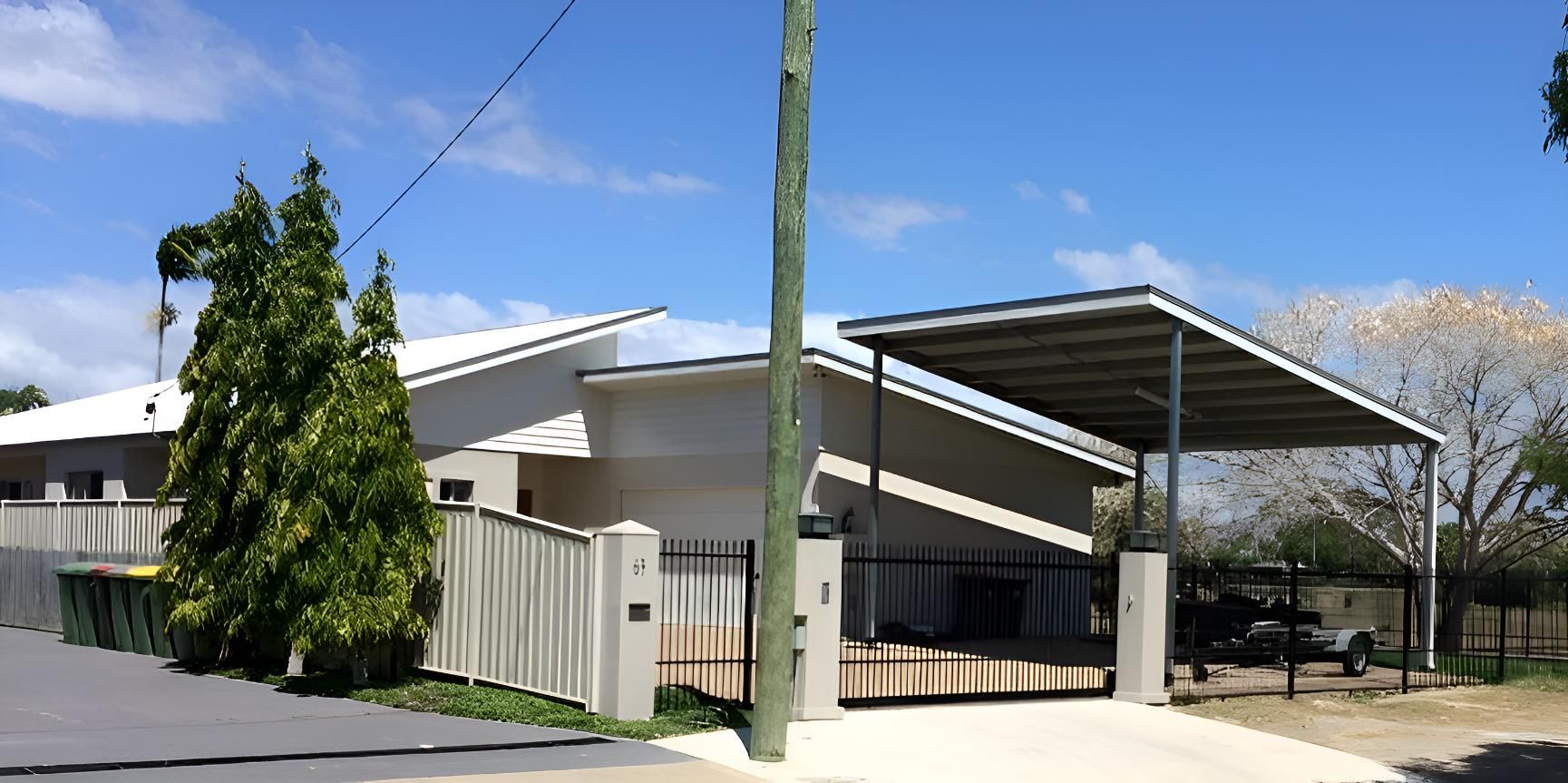 A House With A Carport In Front Of It — Shedquarters In Kirwan, QLD