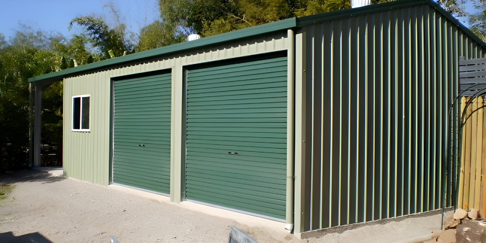 A Green Garage With Two Green Doors And A Window — Shedquarters In Kirwan, QLD