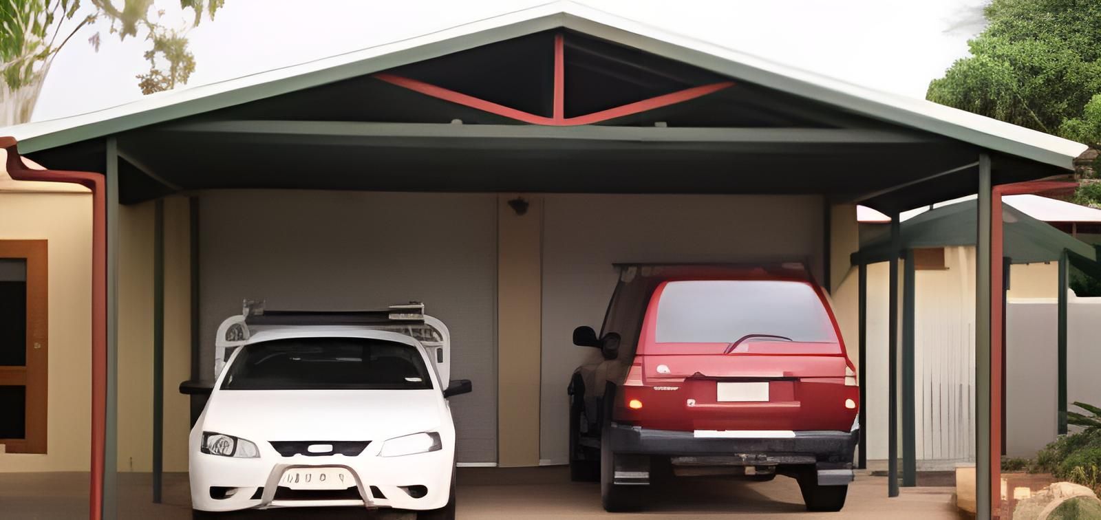 Two Cars Are Parked Under A Carport In Front Of A House — Shedquarters In Kirwan, QLD