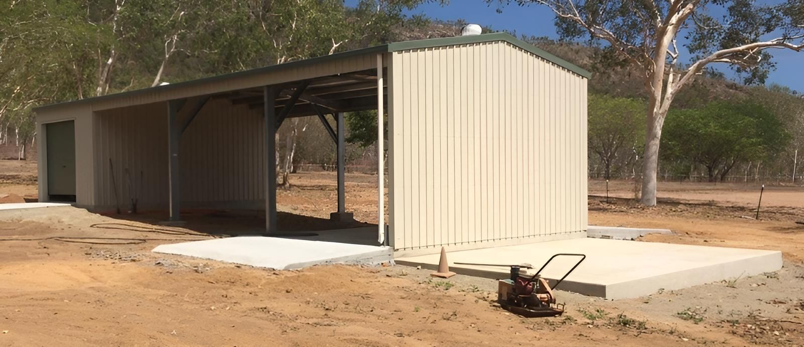 A Shed Is Being Built In The Middle Of A Dirt Field — Shedquarters In Kirwan, QLD
