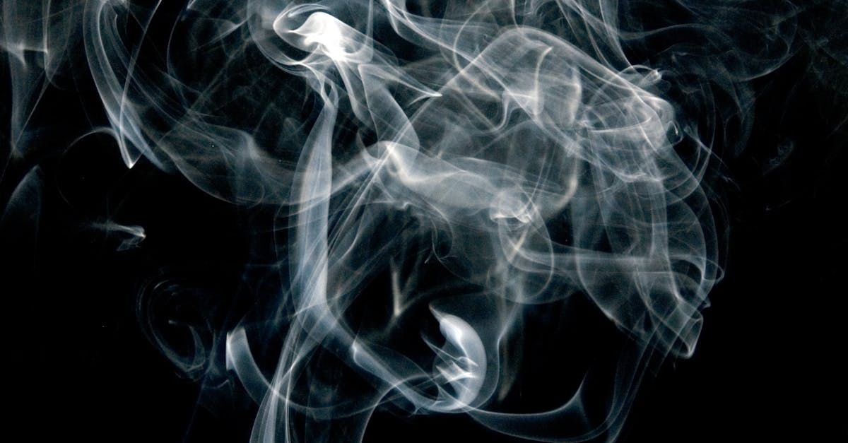 A close up of smoke on a black background.