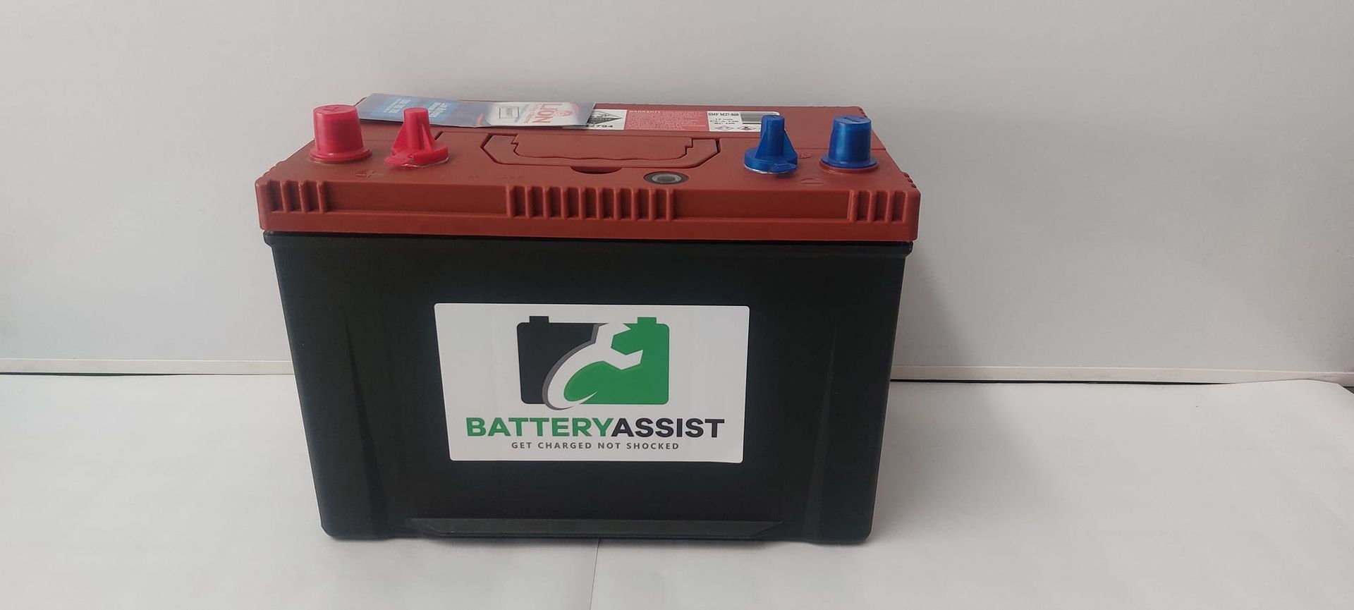 Car Battery With Red and Blue Terminals — Battery Assist Brisbane in Caboolture, QLD