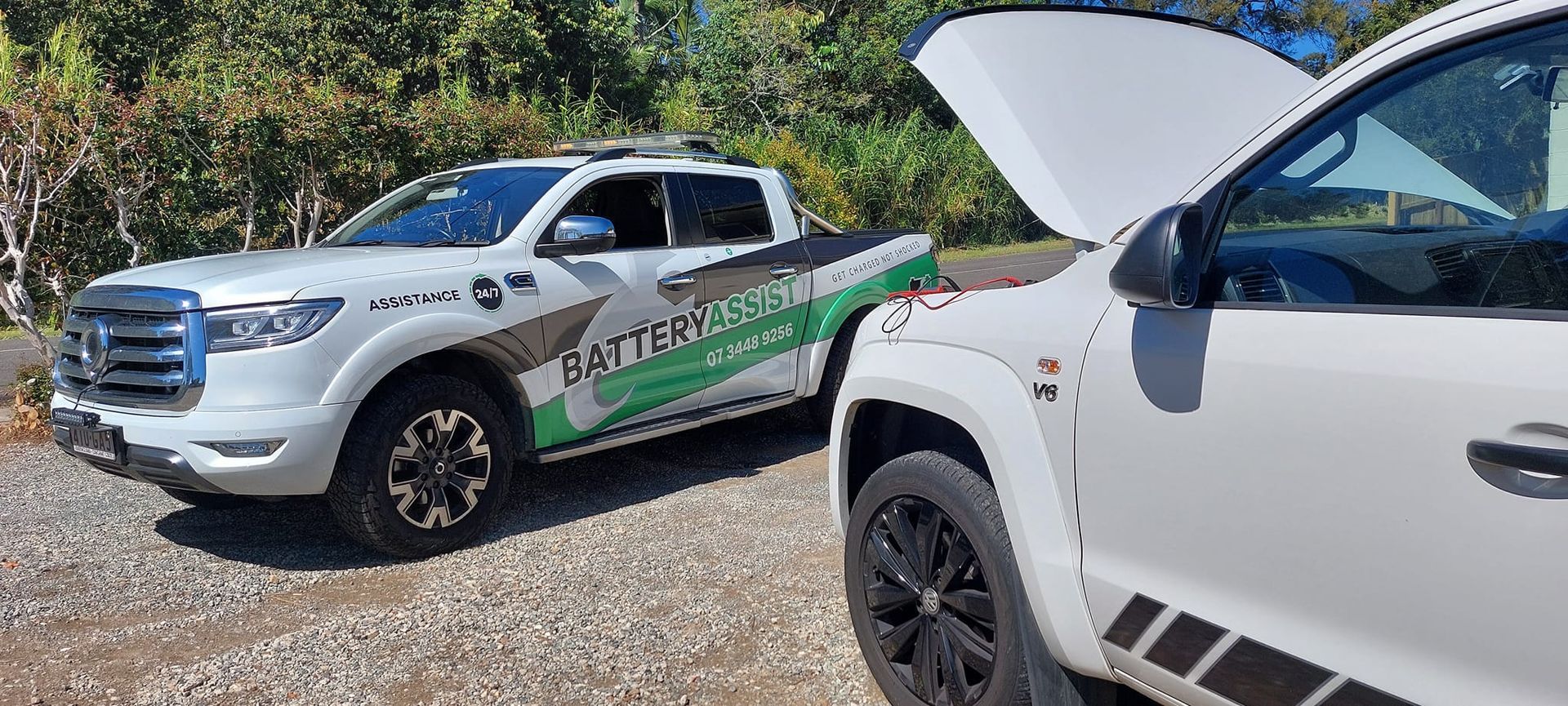 Two White Pickup Trucks — Battery Assist Brisbane in Caboolture, QLD